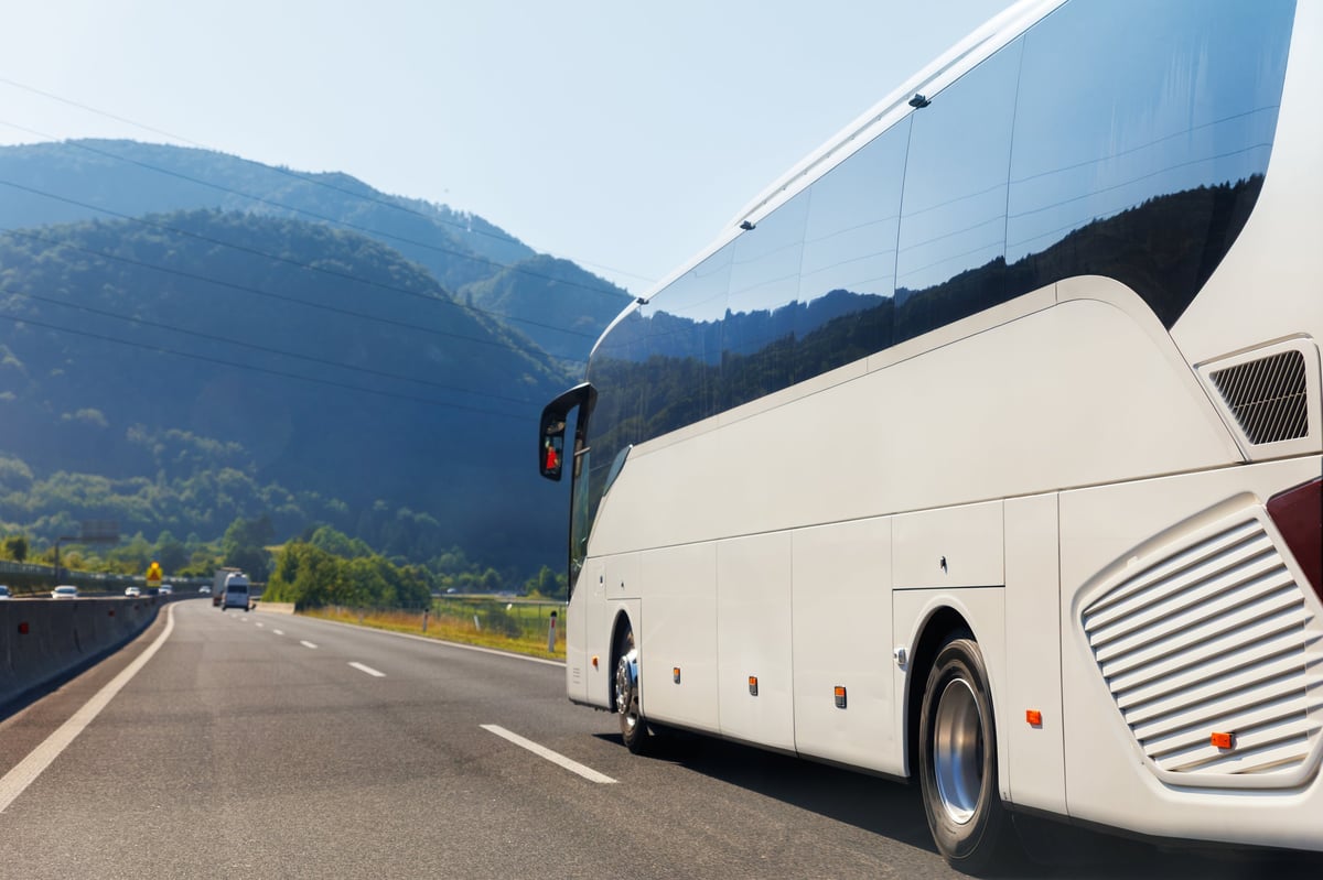 A Baretum Classic coach travelling on an open highway